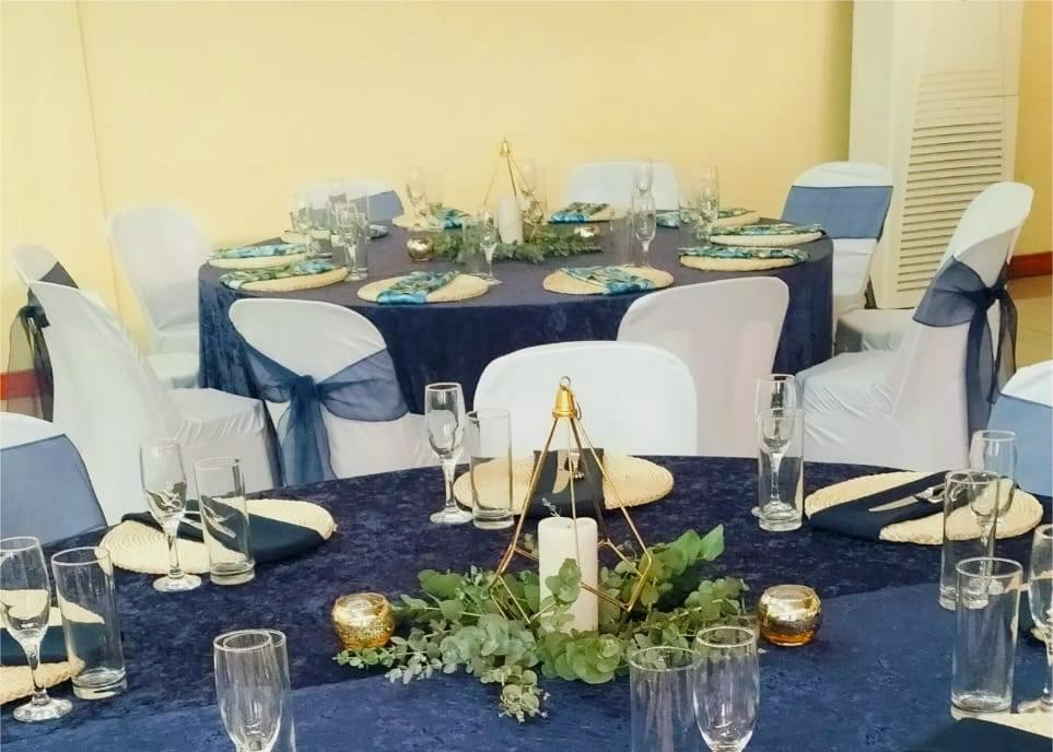 A blue decorated table with cutlery
